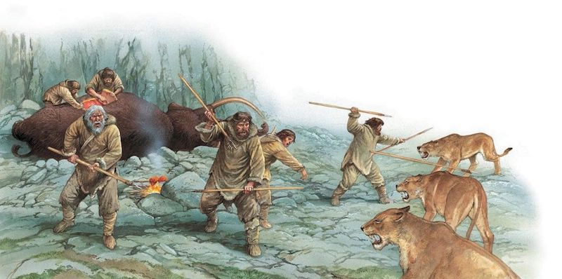 Uomini primitivi difendono la preda